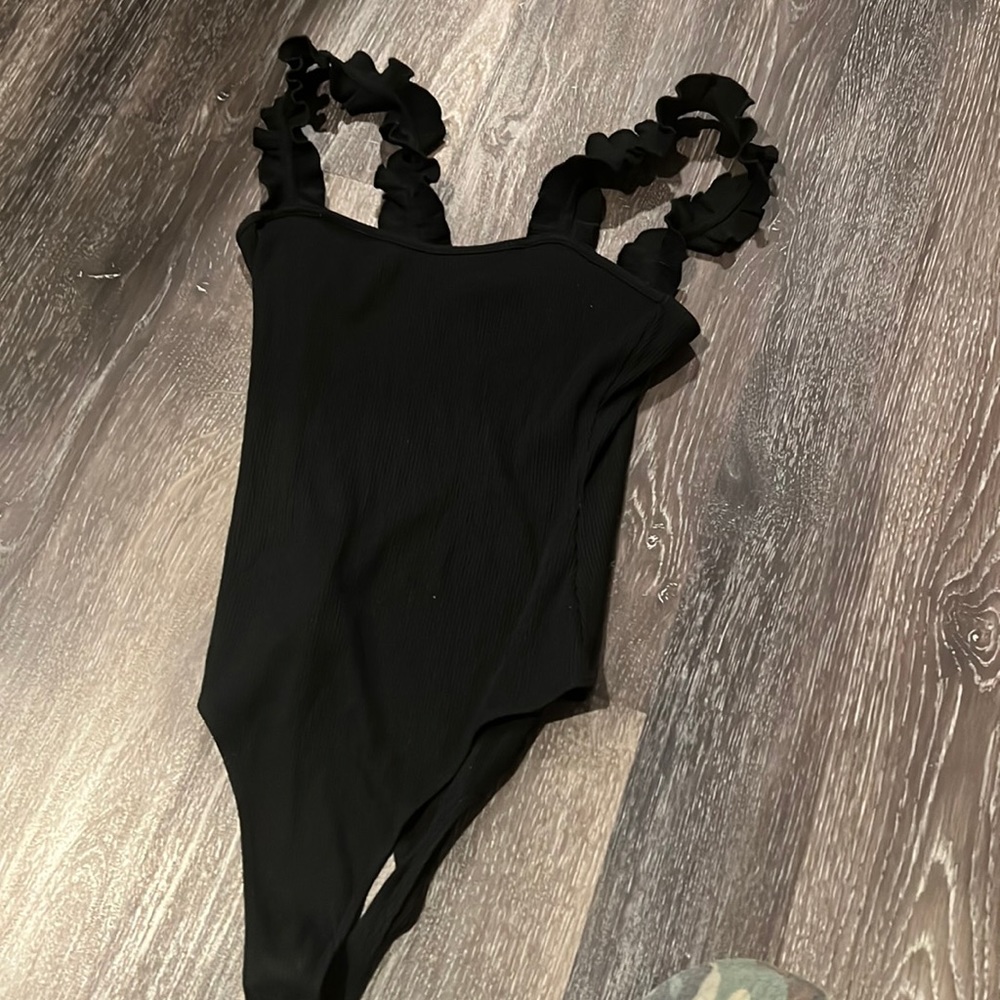 Black bodysuit, flowy straps